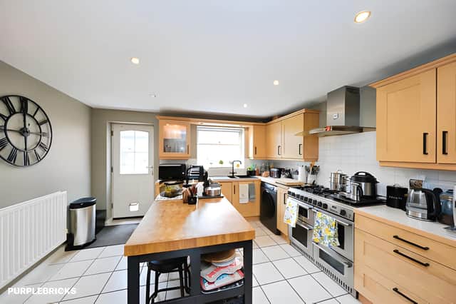 A large kitchen/diner provides the household with a generous central space