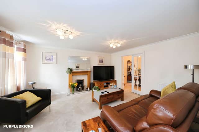 The spacious lounge offers a versatile reception area