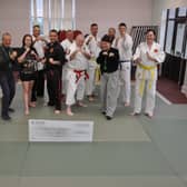 Pictured: Matthew Hyland, Chief Instructor of Jukado-Ryu Martial Arts/Self Defence Group, Derrick Parsons, Senior International Instructor, Members of the Jukado-Ryu Martial Arts/Self Defence Group and Coun Paddy Ducey, Ward Member for Worksop South and Cllr