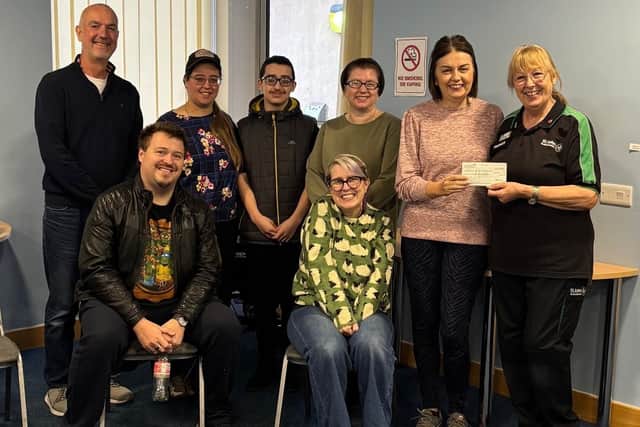 Lindrick Players presenting a donation to St John Ambulance