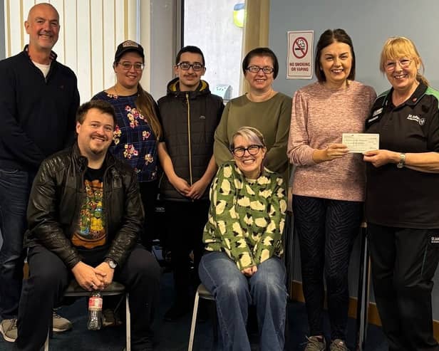 Lindrick Players presenting a donation to St John Ambulance