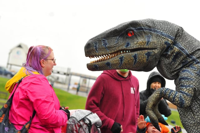 Dinosaurs meet locals in the grounds of Morecambe Town Hall.  Photo by Michelle Adamson.