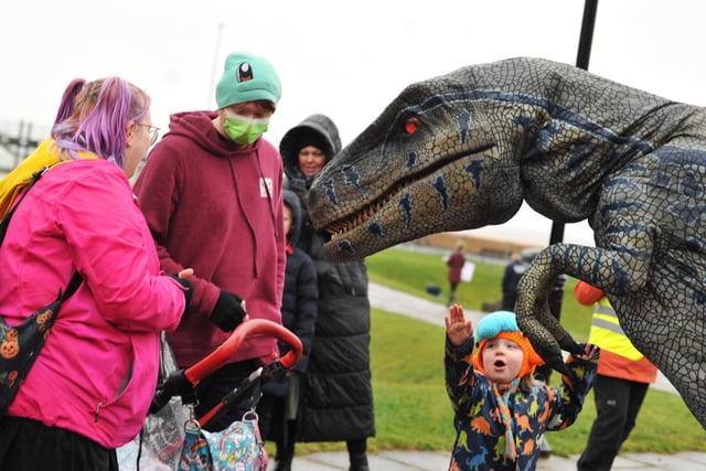 Dinosaurs meet locals in the grounds of Morecambe Town Hall. Photo by Michelle Adamson.