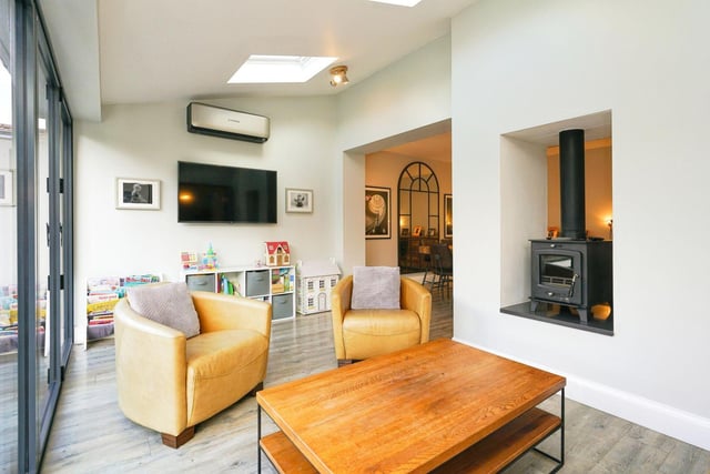 The current owners have created a stunning open plan living space. The living/dining/family room has a feature fireplace with dual aspect log burner.