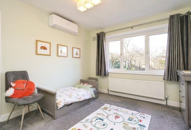 There are two further double bedrooms and two large single rooms.