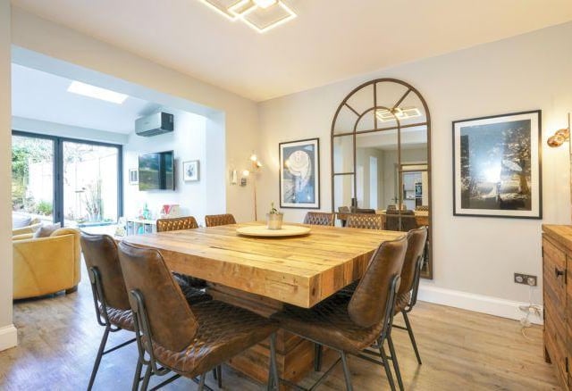 It also has underfloor heating, air conditioning and bi-folding doors leading into the enclosed south facing rear garden.