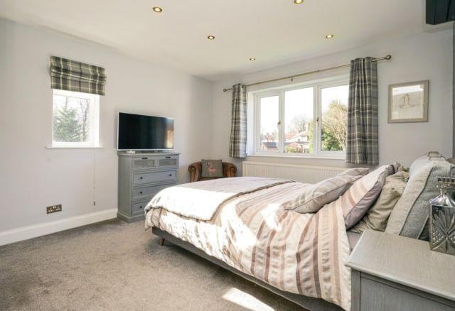 Upstairs are five bedrooms. The master is the largest room and has fitted wardrobes.
