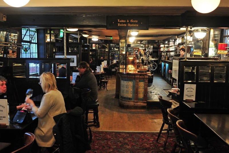 Leeds' oldest pub is preparing to welcome customers back inside the boozer for the first time in more than six months. Cosy up with a pint of Yorkshire-brewed ale while enjoying the traditional decor. It's tucked away on Turk's Head Yard, off Briggate, so perfect for shoppers to dash into when it pours.

Note: Picture taken pre-pandemic