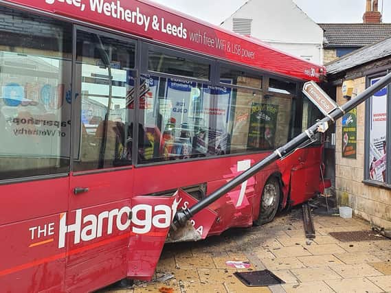 A bus has hit the shop front of Youngs of Wetherby and missed crashing into neighbouring Wetherby Whaler Fish and Chip Restaurants.