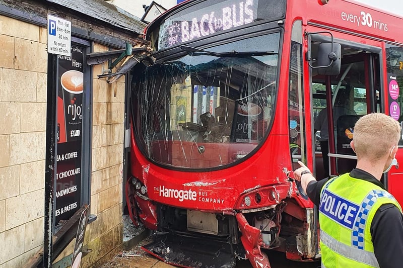 A bus has hit the shop front of the business called Youngs of Wetherby where currently fire crews are checking for structural damage.