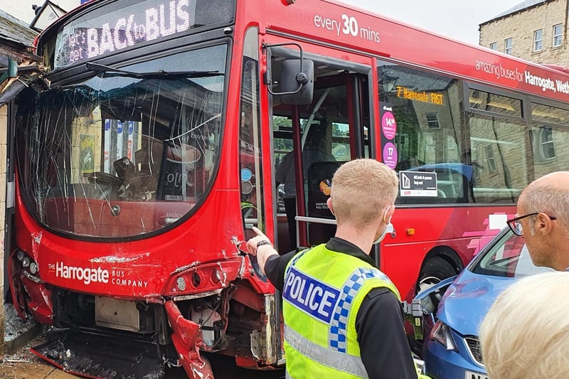 "There was a collision  and the bus hit another car and just seemed to drift across into the shop."