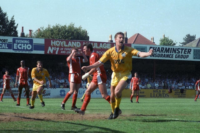Lee Chapman turns to celebrate after watching his header hit the back of the net.