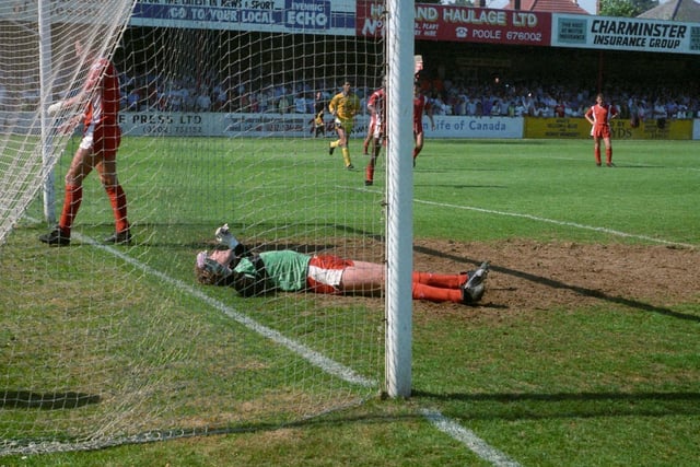 Bournemouth goalkeeper Gerry Peyton is left devastated after Lee Chapman's header finds the back of the net.