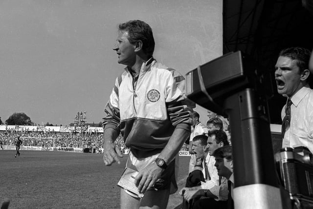 Leeds United manager Howard Wilkinson on the touchline at Dean Court.