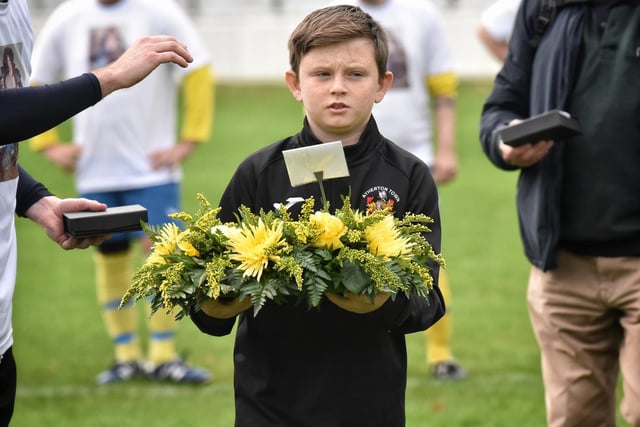 Kieran's nephew Jacob Halliwell (11) carried out the wreath