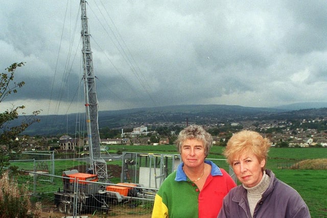 Residents Amanda Taylor (left) and Sue Seeger in front of the telephone mast on The Billing that was being put up despite a petition of more than 500 signatures opposing it.