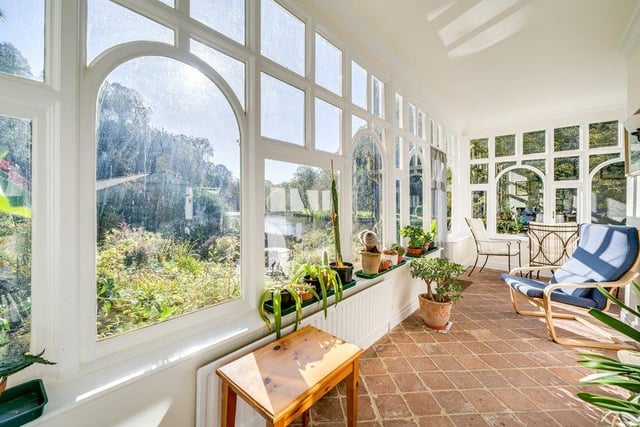 This conservatory makes the most of the waterside views and is the perfect place to relax.