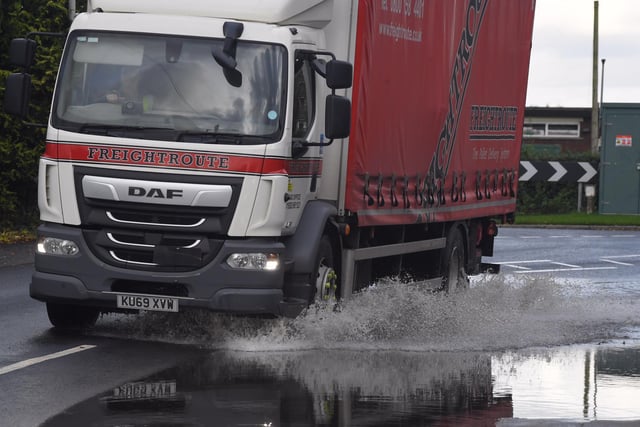 A truck makes its way through the standing water in St Michael's.