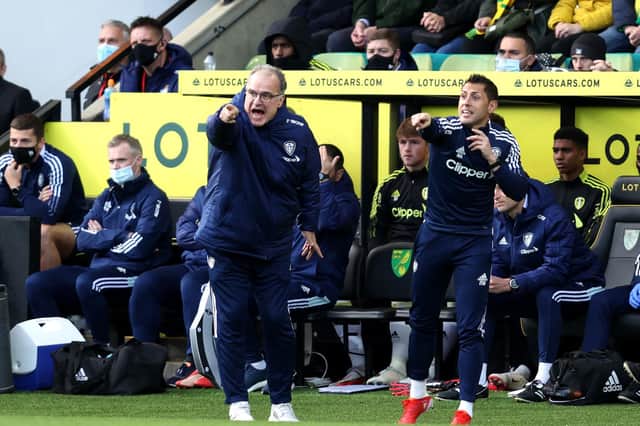 TEN POINTS: Whites head coach Marcelo Bielsa, left, saw his Leeds United side move into double figures for the 2021-22 Premier League season with Sunday's victory at Carrow Road above. Photo by Stephen Pond/Getty Images.