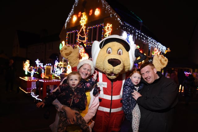 This year he is asking people to donate to support the North West Air Ambulance after last year’s effort which raised £603 for Brian House Children’s Hospice.
Pictured are Rachel and Dean Thomas with children Ava, one, left, and Ella, four, right, with the North West Air Ambulance mascot Paramedic Pup
