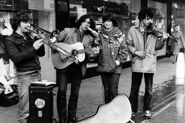 These four musicians, known as the 'Fattening Puddings', are trying to make their mark in the buskers graveyard - Leeds. Pictured in March 1982 are, from left, John Moreman, Colin Spence and his wife Kath, and Buzz Ani.