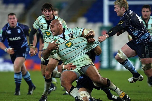 Fearsome Soane Tonga'uiha in the away kit white with flashes of club colours against Cardiff Blues in 2010-11