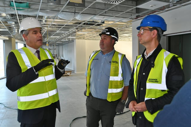 Minister for the Cabinet Office Steve  Barclay MP visiting the Fletton Quays site Government Hub building pictured with  Andy Clayton (project manager) and Vernum Phillips (project developer). EMN-211021-164912009