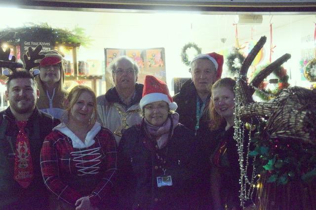 Staff  from M&S Butchers who provide hot snacks and dressed up in their Christmas gear, with Dacorum's Mayor, cllr Fiona Guest and cllr Graeme Elliot