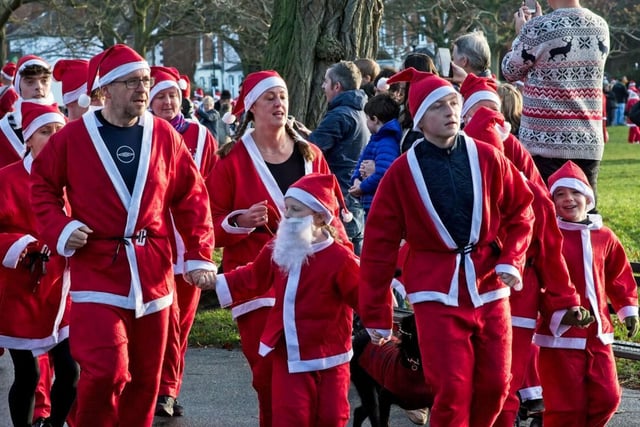 Santas setting off on the 5k course