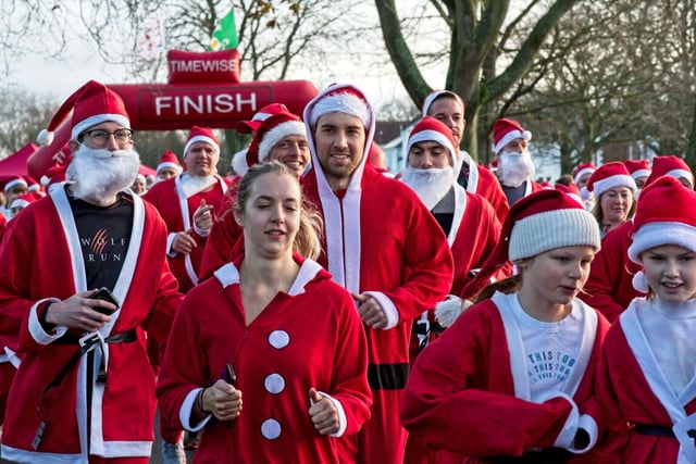 Santas setting off from the start line in Leamington