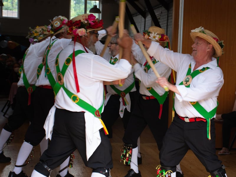 The Morris Dancers perform