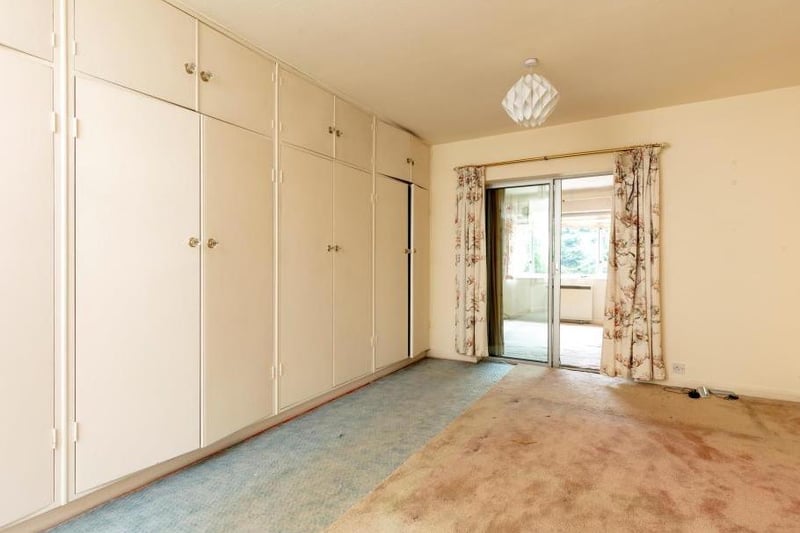 One of the bedrooms with inbuilt wardrobes. Photo by Knight Frank