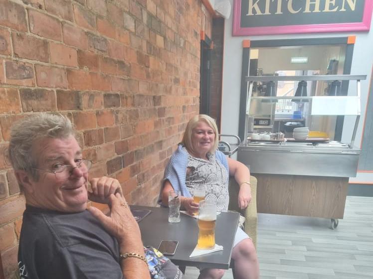 Pete and Diane Tomlinson enjoying a drink in the bar.
