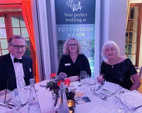 Simon Langton from Denhams, Charlotte Waring from Chestnut Tree House and Reina Alston from Steyning & District Community Partnership at the charity dinner and dance