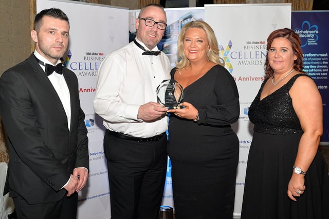 Winners of the Best Customer Service award were Happy Dayz Play Centre. The award was collected by Paul and Laura Gault. Also included are Rodney Hassan, Bid Director, Henry Bros, and Diane Burke, Commercial Director, Mid-Ulster Mail. INMU47-231.