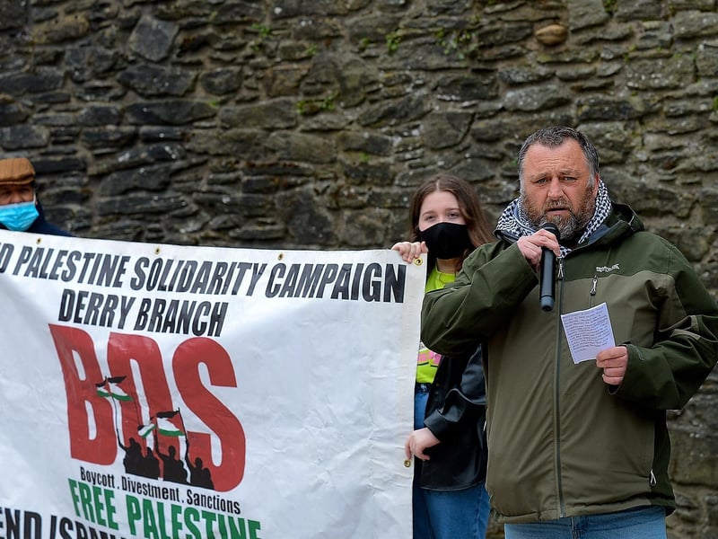 Colr. Gary Donnelly speaking at the rally in Guildhall Square, on Saturday afternoon last, calling for an end to the violence against the people of Palestine. Photo: George Sweeney.  DER2119GS – 024