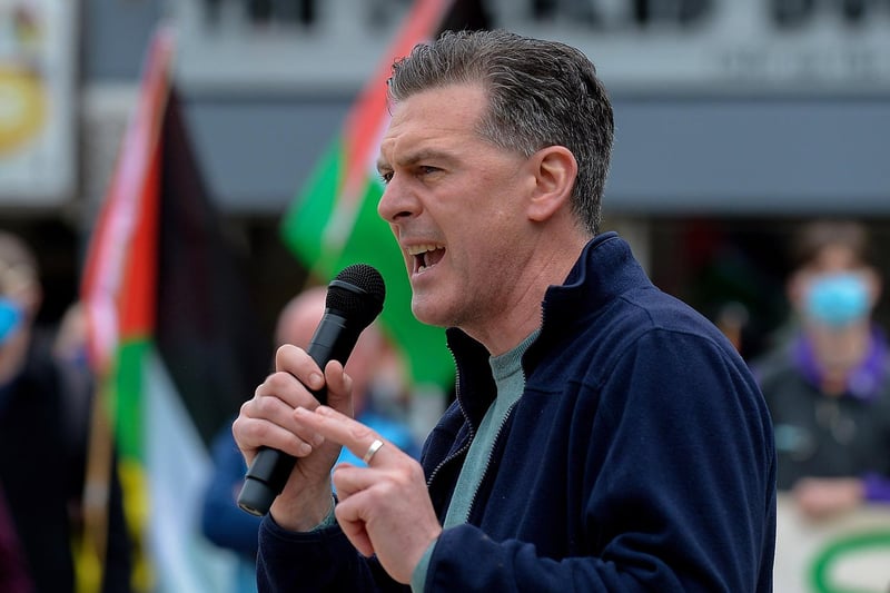 Colr. Shaun Harkin addresses the rally in Guildhall Square, on Saturday afternoon last, calling for an end to the violence against the people of Palestine. Photo: George Sweeney.  DER2119GS – 034