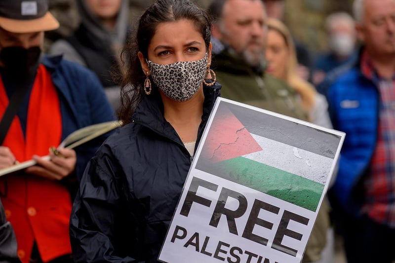 Protester with placard at the rally in Guildhall Square, on Saturday afternoon last, calling for an end to the violence against the people of Palestine. Photo: George Sweeney.  DER2119GS – 035