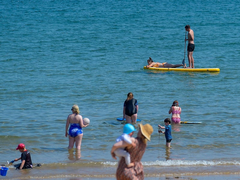Cooling down in the water at Shrove beach during the recent mini heat wave in Inishowen. DER2129GS - 077
