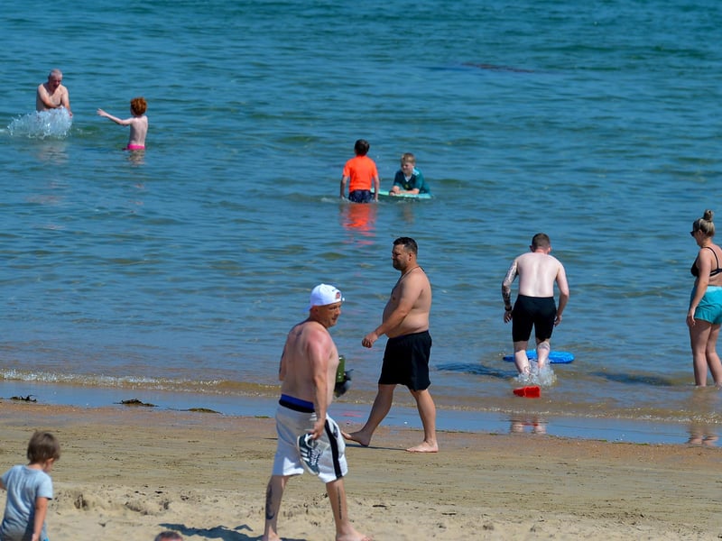 Bathers on Shroove beach, Inishowen, during the recent mini heatwave. DER2129GS - 063