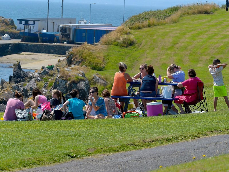 People enjoy the fine weather in Moville, during the recent hot spell. DER2129GS - 060