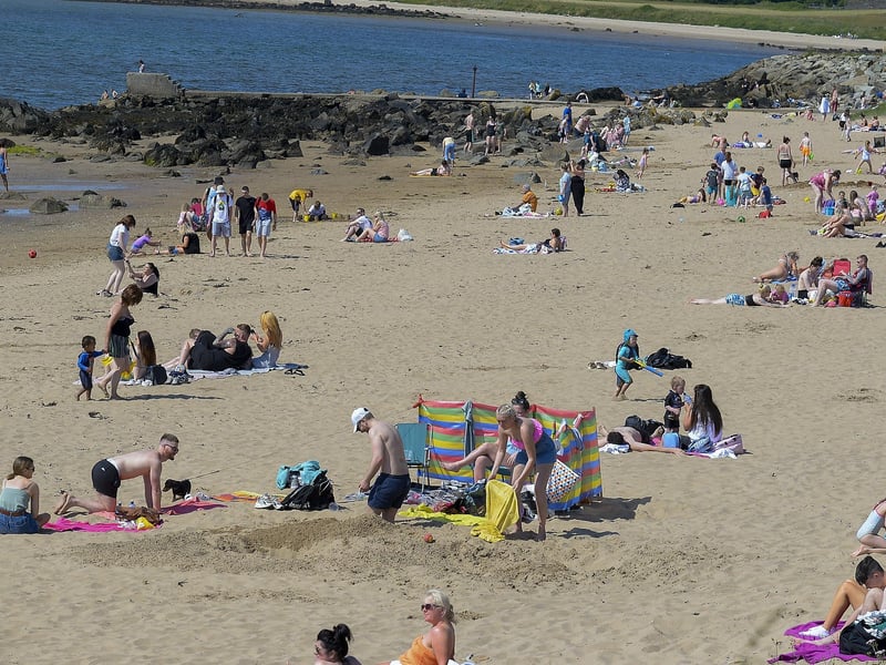 Lady’s Bay on Buncrana’s Shore Front, on Saturday afternoon last. People from Derry flocked to Inishowen’s beaches to enjoy the fine weather. Photo: George Sweeney. DER2128GS – 045