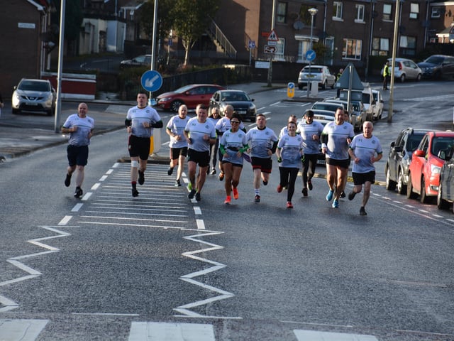 Some of the 22 runners who completed a range of fundraising runs throughout the past year to raise funds for the refurbishment of the H Block Monument in Derry.