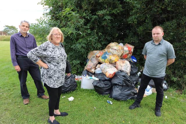 Councillors Josie Potts, John Shephard and Clayton Tindle  survey the rubbish left behind. Photo: Councillor Simon Greaves