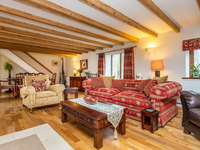 The majestic sitting room from a different angle. Class and comfort.