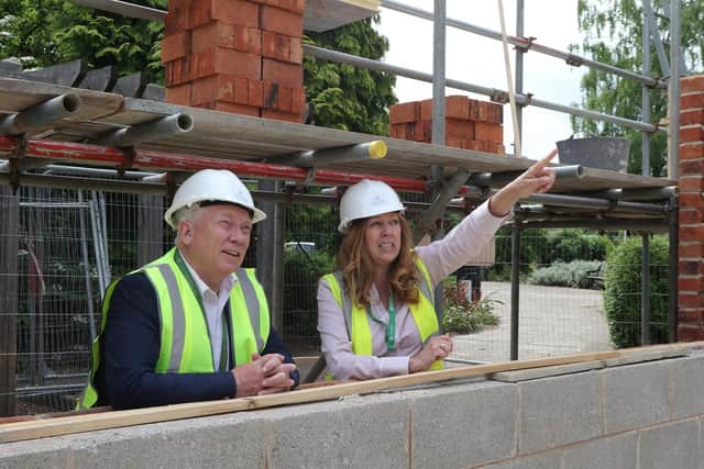 Bassetlaw District Council chief executive Neil Taylor and project manager Jane Harrison at the new block being built at the Canch - just one of three multi-million pound building projects being built in the town.
