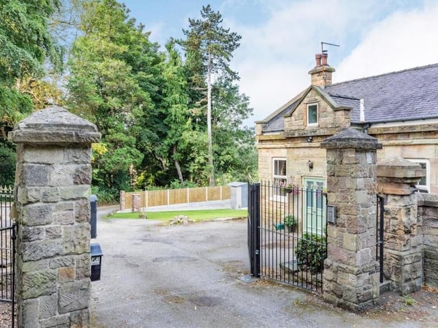 Please come in! One of the welcoming entrances to the manor, which is operated by wrought-iron electronic gates. As you can see, there is plenty of parking space.