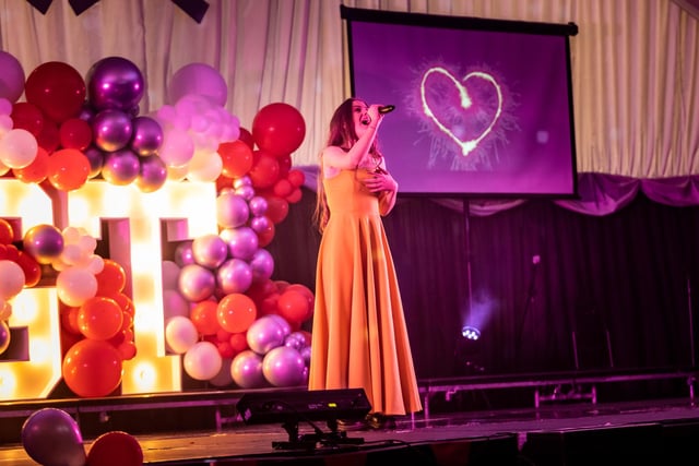 14-year-old Faith Birnie spread love through the arena with her performance of Queen's Somebody to Love.