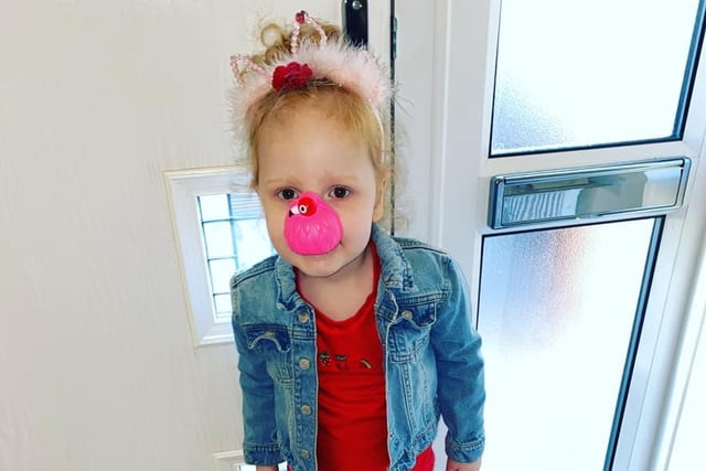 Sweet little Pippa, aged three, enjoyed dressing up with her unique flamingo-red nose and tiara while raising money for the cause.