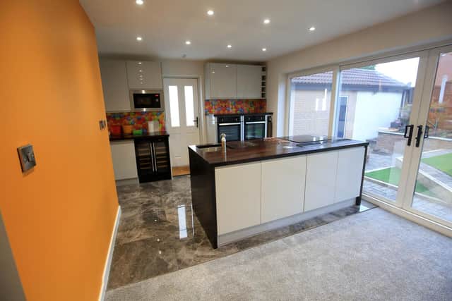 The open plan kitchen looks out onto the garden. Picture: Chris Etchells